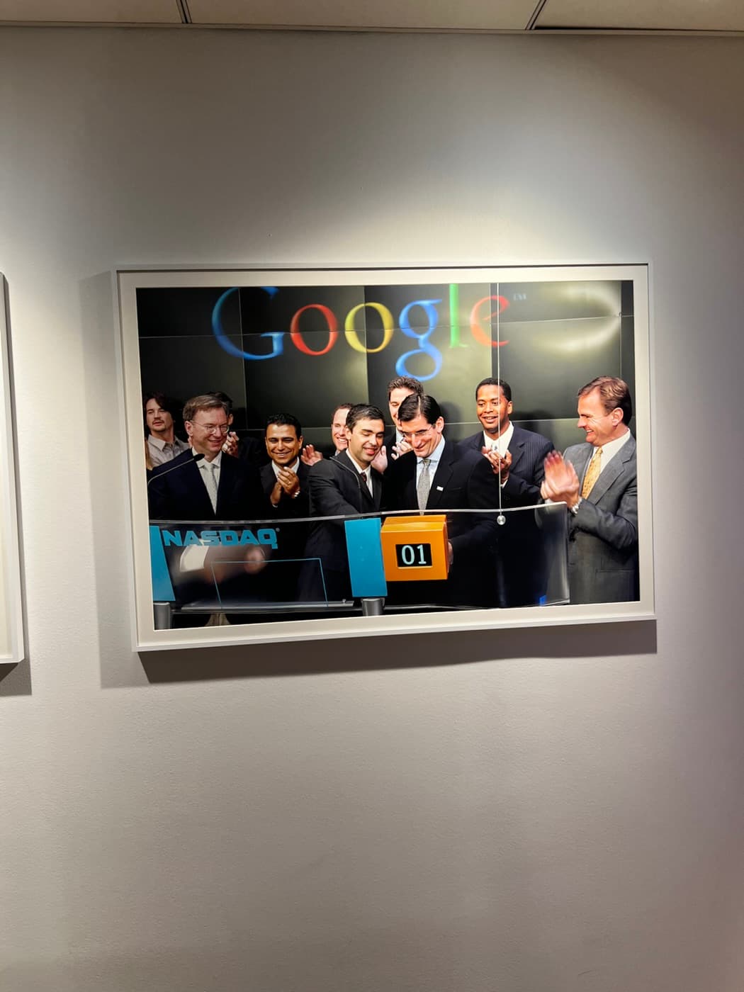 Framed photo of the Google IPO bell at Nasdaq