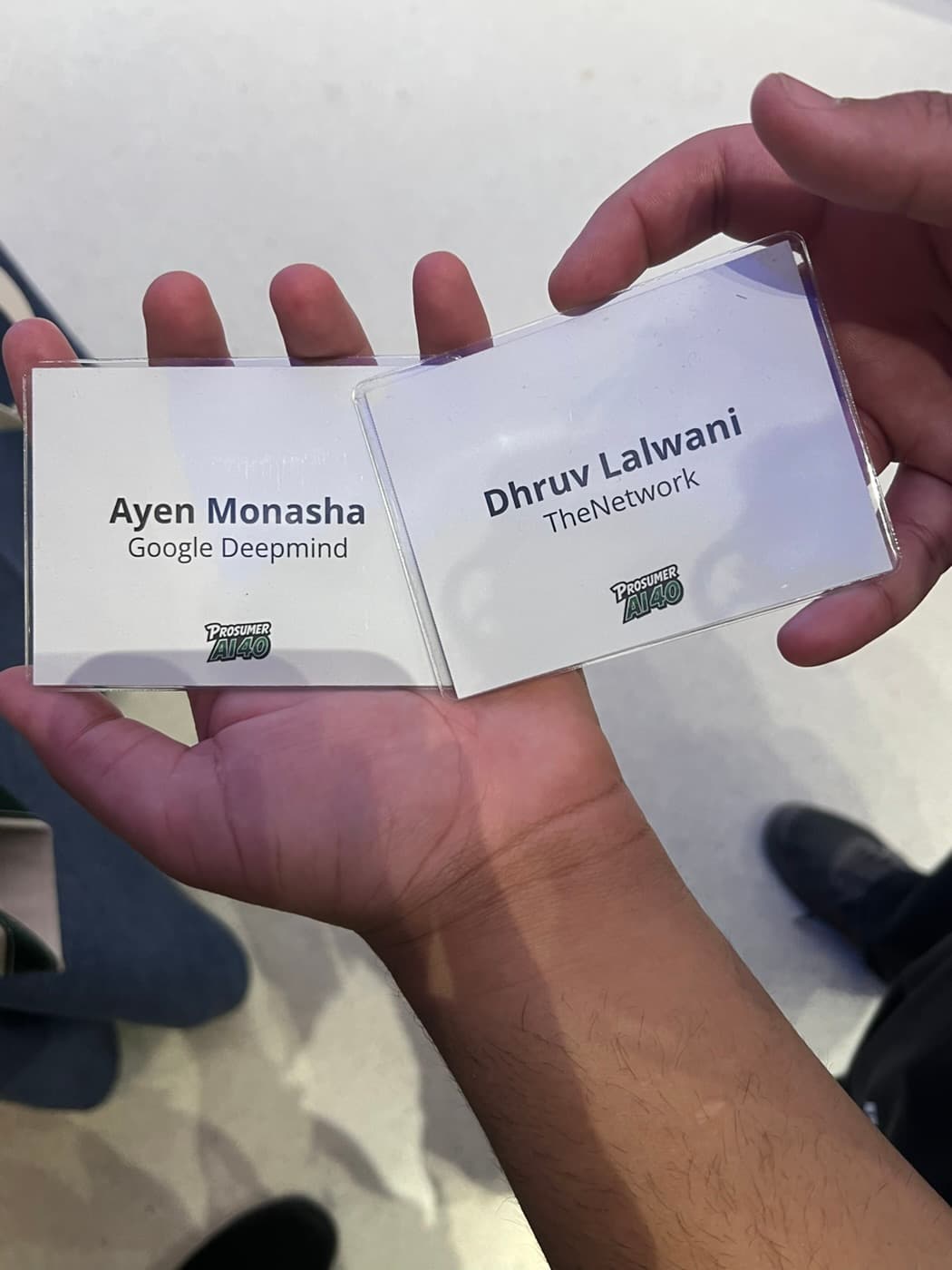 Prosumer AI40 name badges for Dhruv Lalwani and Ayen Monasha